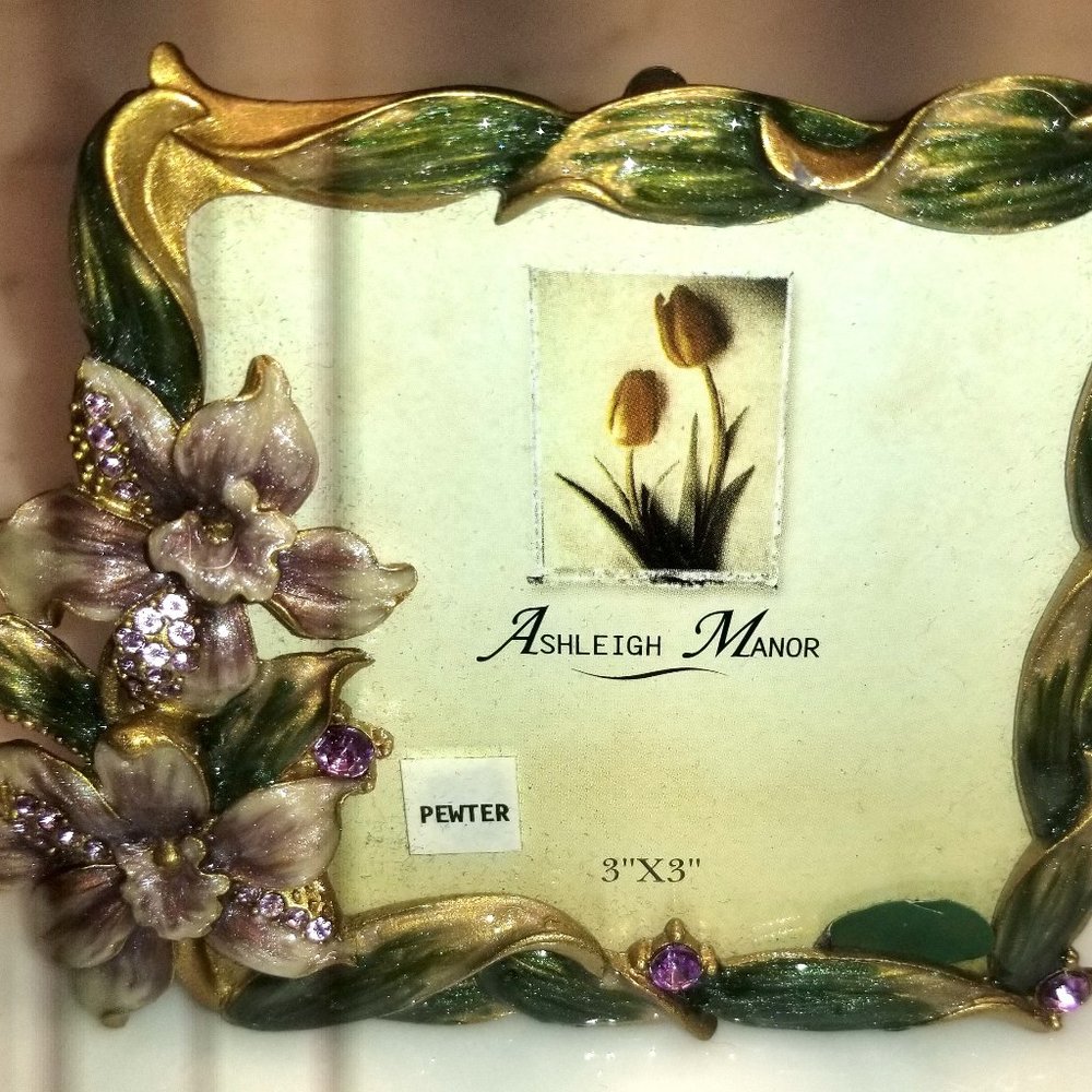 Enamel and stone frame by Ashleigh Manor